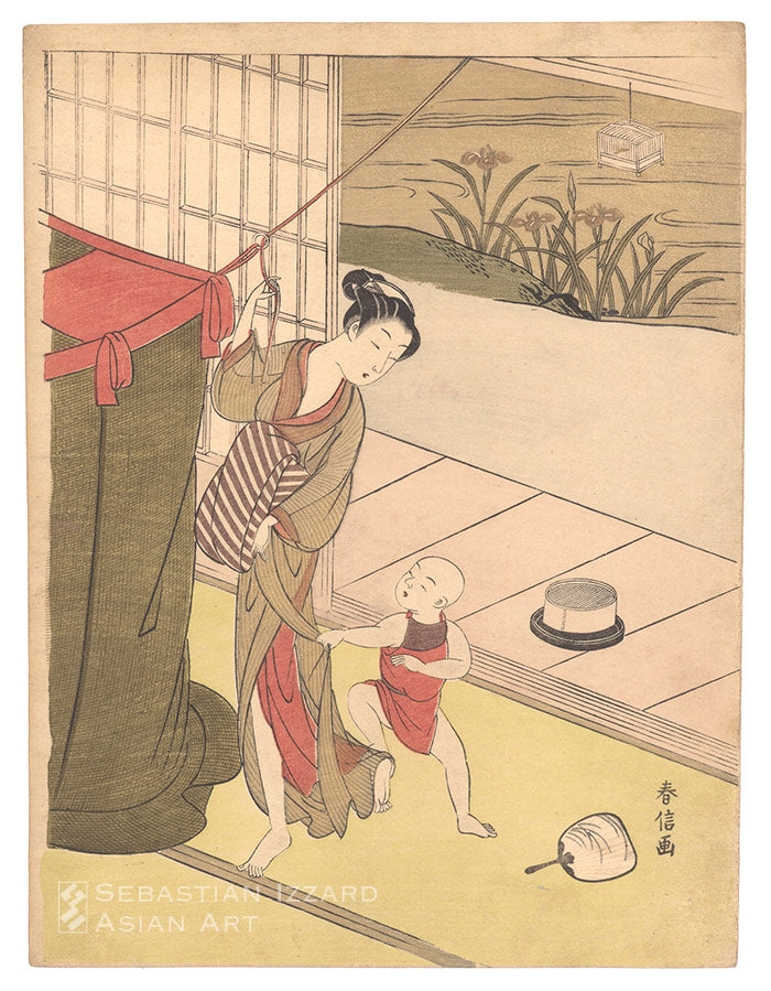 Mother and Child Hanging a Mosquito Net