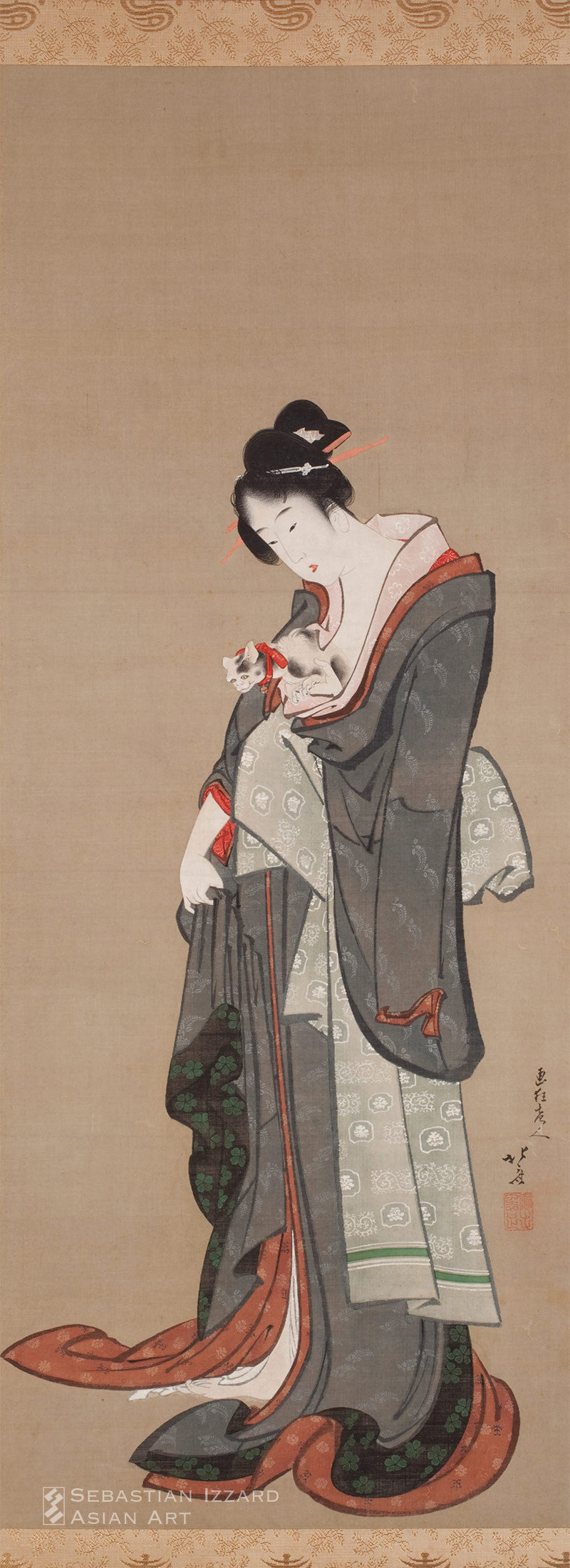 Young Beauty Holding her Kitten