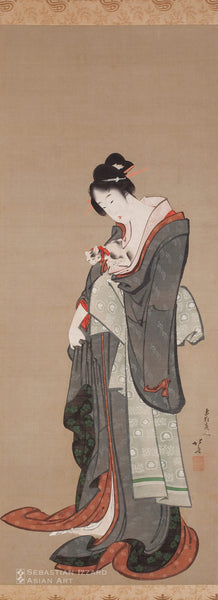 Young Beauty Holding her Kitten