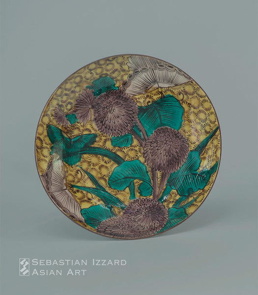 LARGE DISH WITH CHRYSANTHEMUM AND BUTTERFLY<br>Hizen ware, <i>Aode-Kokutani</i> type: porcelain with colored enamels Japan, Edo period, circa 1650 D. 13⅝ in. (34.6 cm)