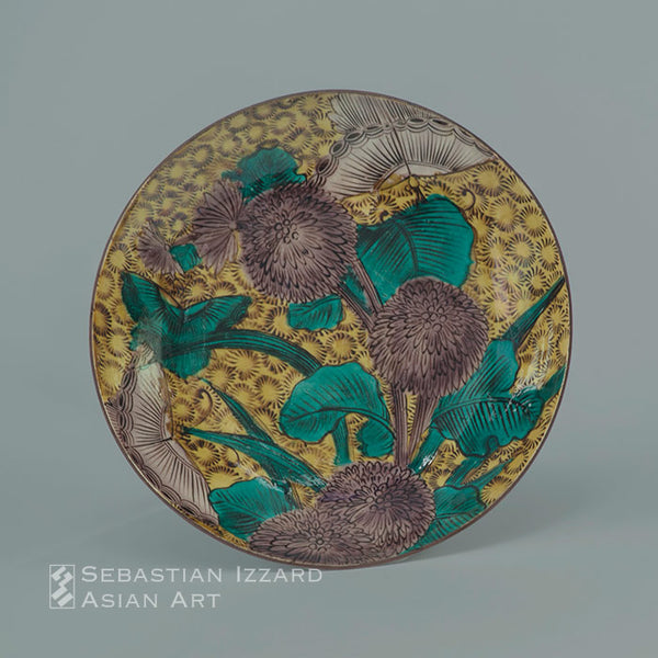 LARGE DISH WITH CHRYSANTHEMUM AND BUTTERFLY  Hizen ware, Aode-Kokutani type: porcelain with colored enamels Edo period, ca. 1650 Diameter 13⅝ in. (34.6 cm)