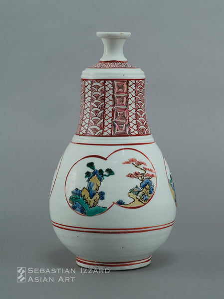 TEA WHISK-SHAPED BOTTLE WITH LANDSCAPE PANELS  Hizen ware, Kokutani type: porcelain with colored enamels Edo period, ca. 1650 Height 10⅝ in. (27.0 cm)