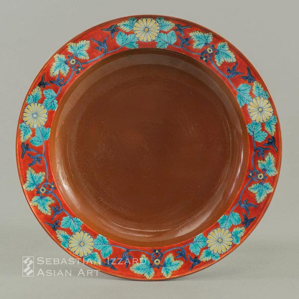 DISH WITH CHRYSANTHEMUM DESIGN Hizen ware, Nangawara kilns: porcelain with underglaze blue, iron brown, and colored enamels Edo period, Genroku era (1688–1704) 24.5 cm diameter
