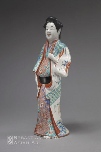 Standing Figure of a Beauty Edo period, late 17th century Hizen ware, Kakiemon type porcelain with underglaze blue  and colored enamel decoration 39.3 cm high