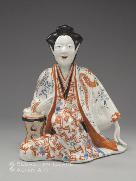 Seated Figure of a Beauty Arita ware, Kakiemon type porcelain with gilt and colored enamels Edo period, last quarter of 17th century 28 x 23 x 25 cm