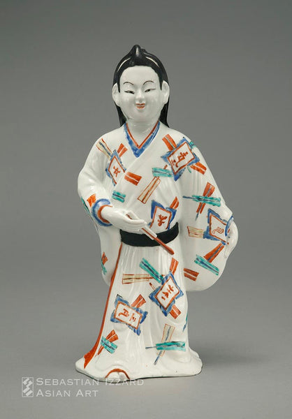  STANDING FIGURE OF A YOUNG MAN (WAKASHU)  Hizen ware, Kakiemon type: porcelain with overglaze enamels Edo period, circa 1680s Height 29.5 cm