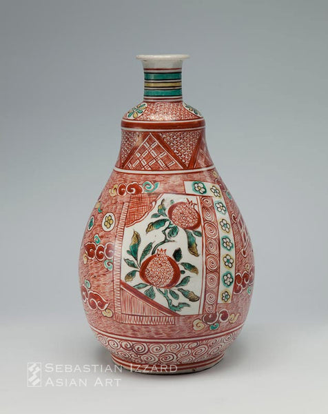 WINE BOTTLE FLORAL PANEL DECORATION  Hizen ware, Kokutani type: porcelain  with over-glaze iron-red and yellow and green enamels  Kambun era, 1661–72 H: 25.1 cm