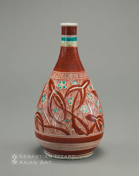 WINE BOTTLE WITH LEAF AND PLUM BLOSSOM DECORATION Hizen ware, Ko-Kutani type: porcelain with overglaze iron-red, yellow, and green enamels Edo period (1615–1868), Kambun era, 1661–72