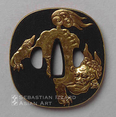 Hidari Yasuchika (active second half of 18th century) Tsuba with shishi and a peony in bloom 7.6 x 7 cm.