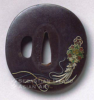 Hidari Harunari (d. 1840) Tsuba with kusadama 7 x 6.7 cm.