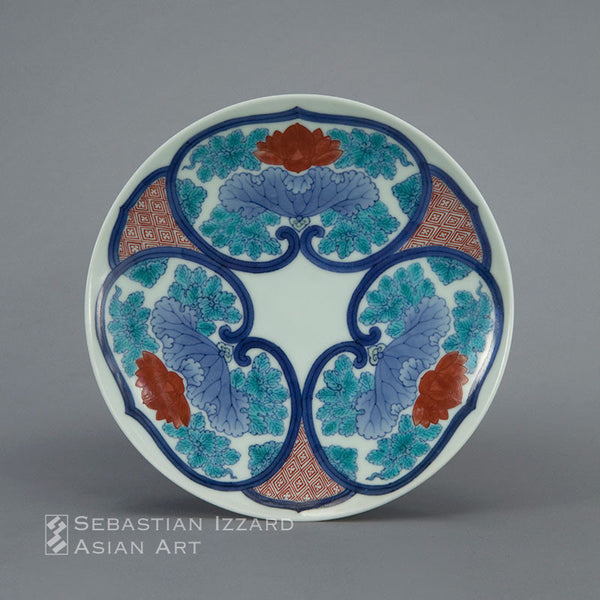 DISH WITH MALLOW DESIGN Hizen ware, Nabeshima type: porcelain with underglaze blue, iron red and colored enamels Edo period, Kambun era, 1661–72 Diameter 19.4 cm