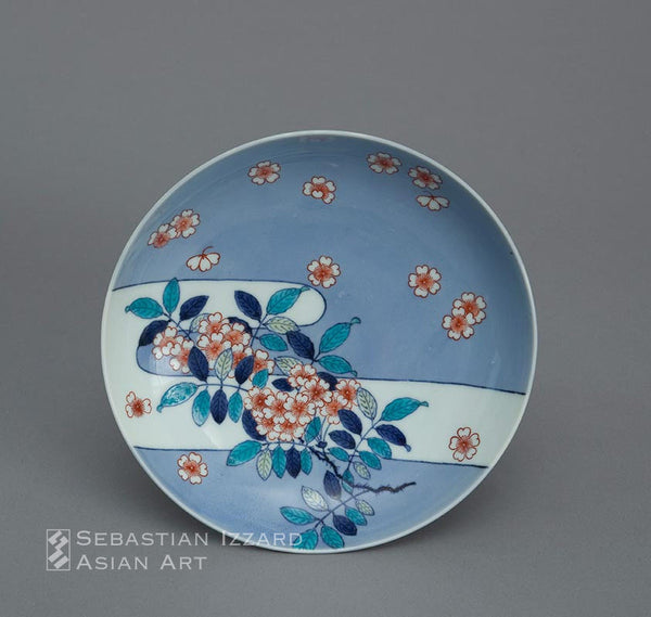 FIVE PORCELAIN DISHES  Hizen ware, Nabeshima type: porcelain with underglaze blue, and over-glazed iron-red and colored enamel decoration Edo period, early 18th century, Hoei/Shotoku eras (1704−16) Diameter: each 20.3 cm approx.  Provenance: James Alexander Scrymser (1839−1918), acquired in Japan in either 1898 or 1899, and thence by descent